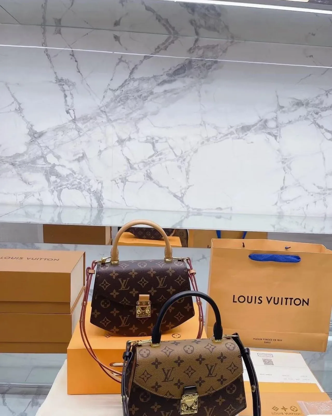 Louis Vuitton Métis Top-Handle Bag photo 1